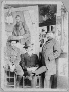 Picasso, Pedro Manach y Torres Fuster con retrato de Iturrino en la pared. 1901